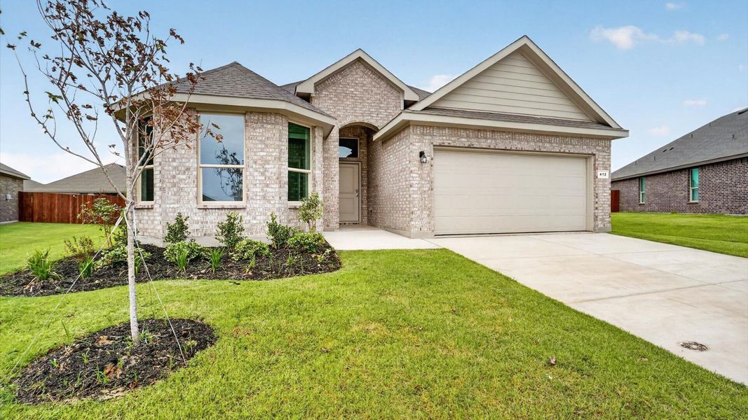 Front exterior of a new home in Saratoga, Granbury, TX, highlighting curb appeal (Image 2).