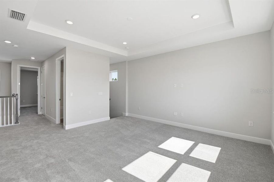 Spacious, unfurnished interior of a new home in Harvest at Ovation, Winter Garden (Image 30).