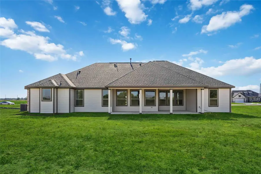 Exterior details and patio area of a home in Blue Heron Estates, Beasley (Image 4).