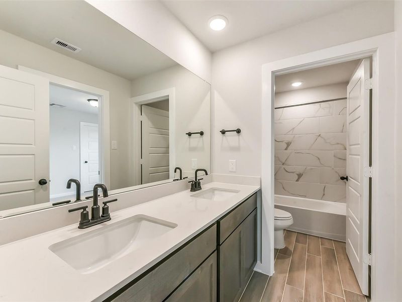 Furnished interior view inside a new home in Sundance Cove, Crosby (Image 36).