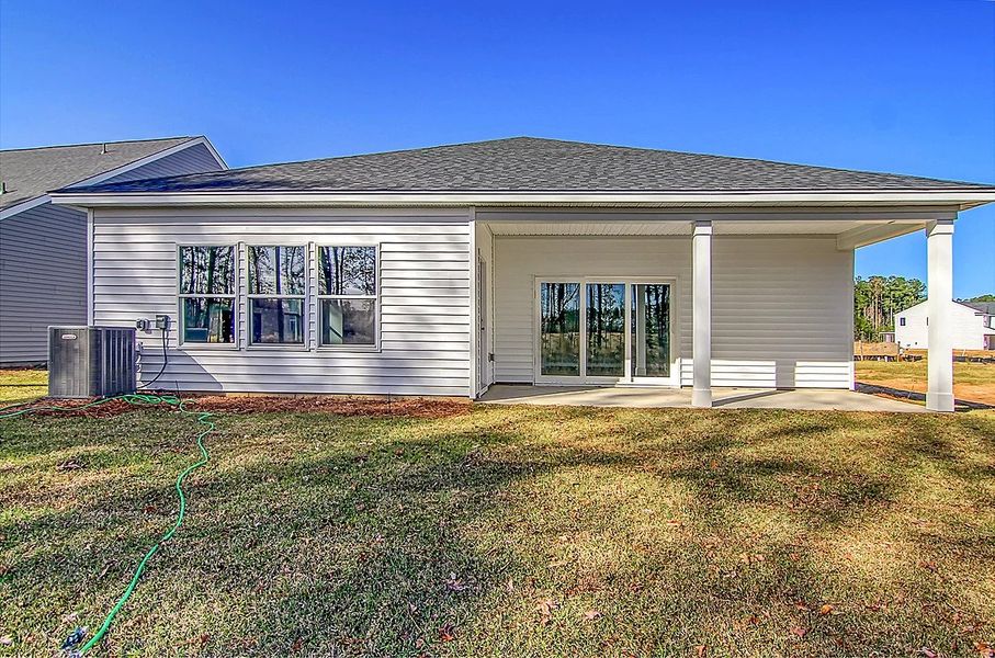 Representative exterior photo of a completed home built from the Truman by Ashton Woods in Watson Hill, Summerville, SC (Image 16).