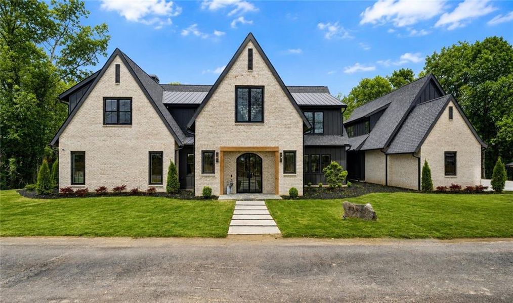 Front exterior of a new home in , Dacula, GA, highlighting curb appeal (Image 22). Front exterior of a new home in , Dacula, GA, highlighting curb appeal (Image 22).
