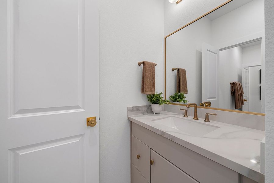 Furnished interior view inside a new home in The Highlands 50', Porter (Image 39).