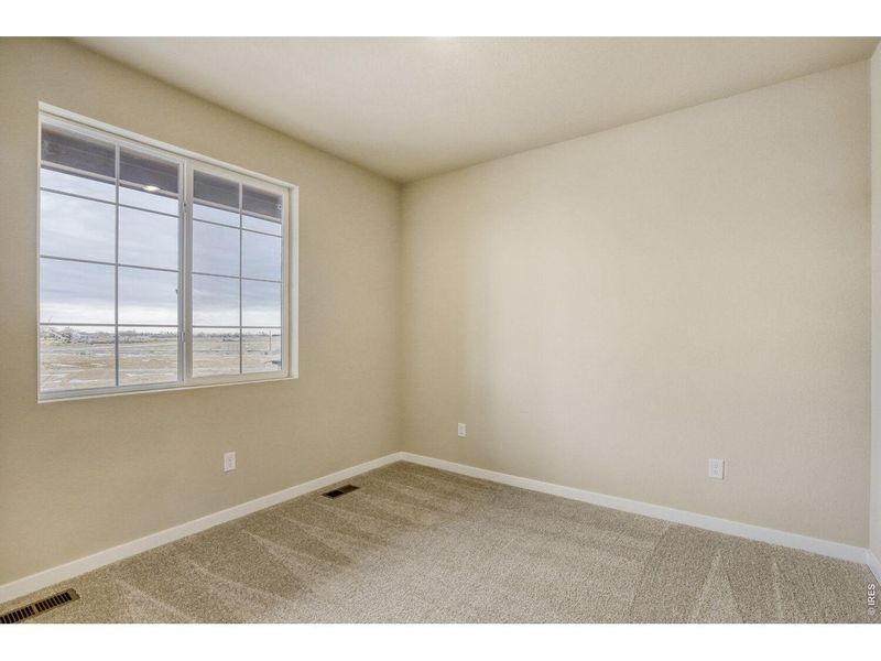 Spacious, unfurnished interior of a new home in Farmstead, Berthoud (Image 21).
