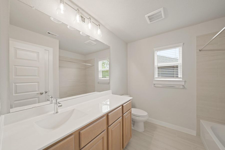 Furnished interior view inside a new home in Barton Creek Ranch, Conroe (Image 4). Furnished interior view inside a new home in Barton Creek Ranch, Conroe (Image 4).