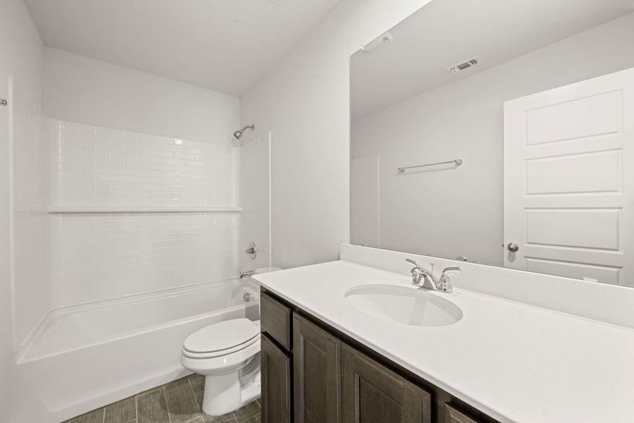 Front exterior of a new home in Mountain Valley, Burleson, TX, highlighting curb appeal (Image 24).