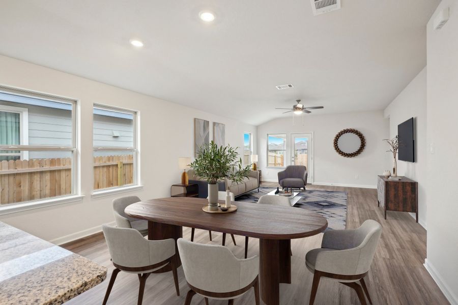 Virtually staged dining room in the Allen floorplan at a Meritage Homes community.