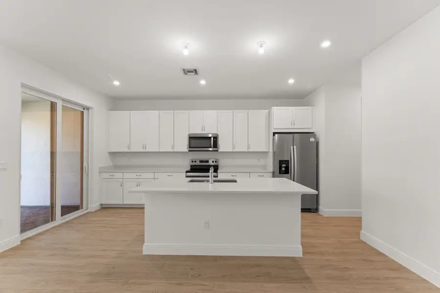 Furnished interior view inside a new home in Avila, Jensen Beach (Image 3).