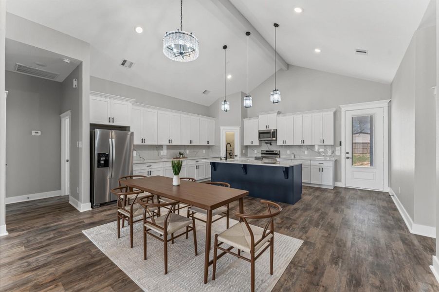 Open dining area just off the kitchen, filled with natural light and plenty of room for a full-size dining table. Open dining area just off the kitchen, filled with natural light and plenty of room for a full-size dining table.
