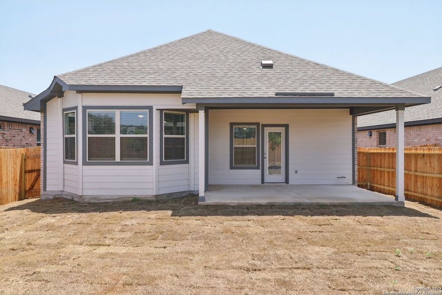 Front exterior of a new home in Arcadia Ridge - Premier Series, San Antonio, TX, highlighting curb appeal (Image 18). Front exterior of a new home in Arcadia Ridge - Premier Series, San Antonio, TX, highlighting curb appeal (Image 18).