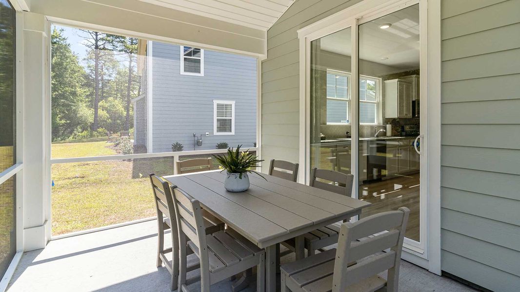 Exterior details and patio area of a home in Waterbridge, Myrtle Beach (Image 2).