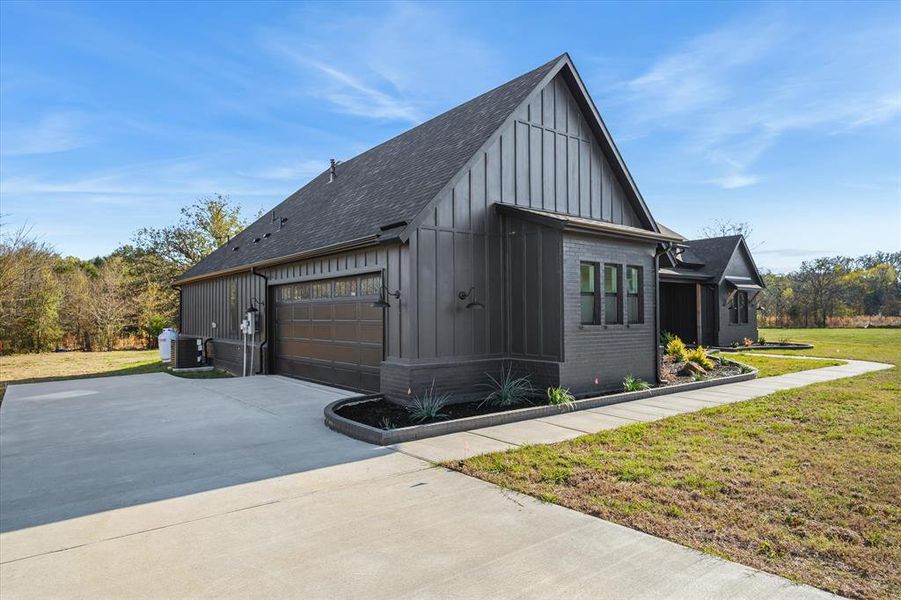 Front exterior of a new home in , Canton, TX, highlighting curb appeal (Image 25). Front exterior of a new home in , Canton, TX, highlighting curb appeal (Image 25).