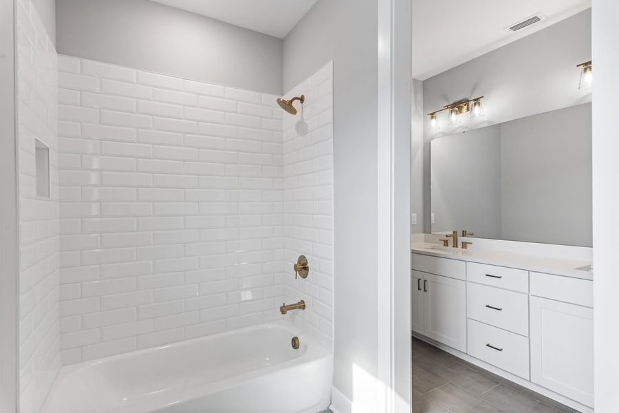 Representative furnished interior of a home built from the Marino by Brock Built in Nautilus Pointe, Inlet Beach (Image 33).
