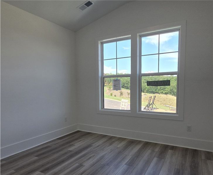Well-lit 2nd bedroom or study with ample natural l