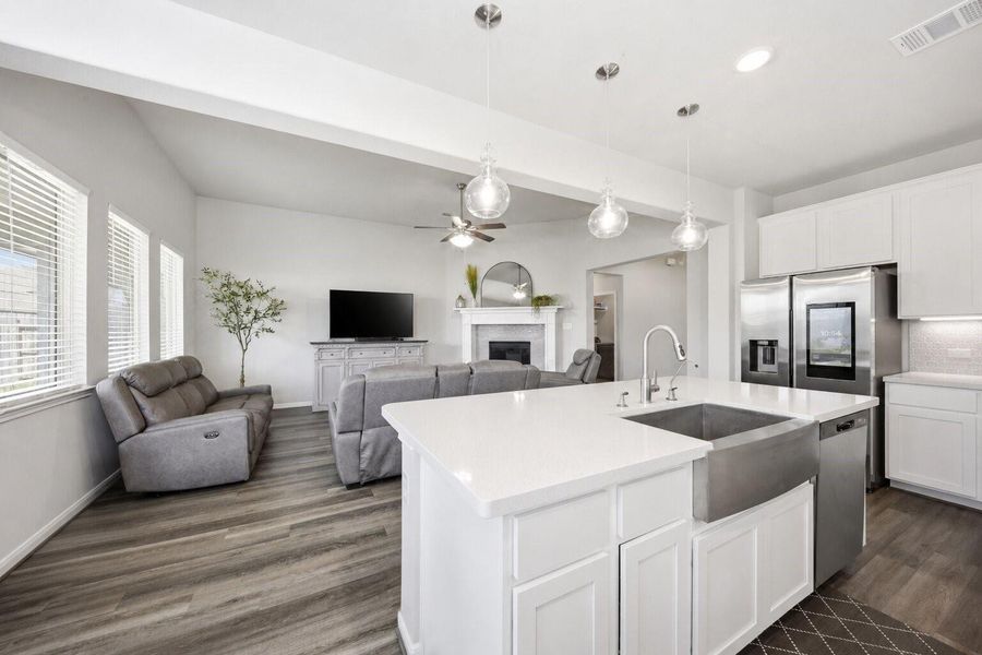 Kitchen opens to the living room for easy entertaining Kitchen opens to the living room for easy entertaining