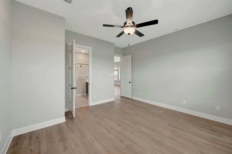 Spacious, unfurnished interior of a new home in Prairieland Village - Grove Collection, Cypress (Image 22). Spacious, unfurnished interior of a new home in Prairieland Village - Grove Collection, Cypress (Image 22).