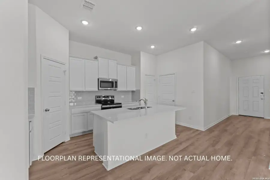 Furnished interior view inside a new home in High Branch, San Marcos (Image 6).