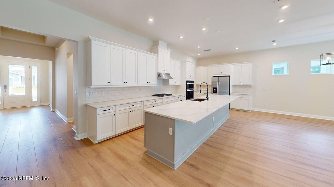 Furnished interior view inside a new home in RiverTown - WaterSong, St. Johns (Image 2).