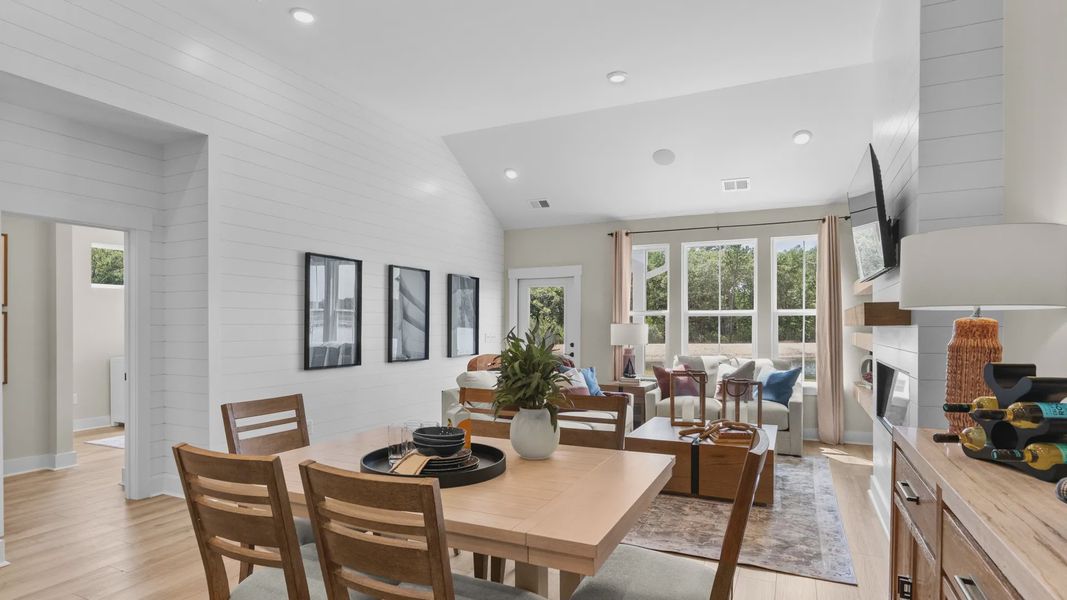 Dining area in the Summit home plan with open-concept design and natural light.