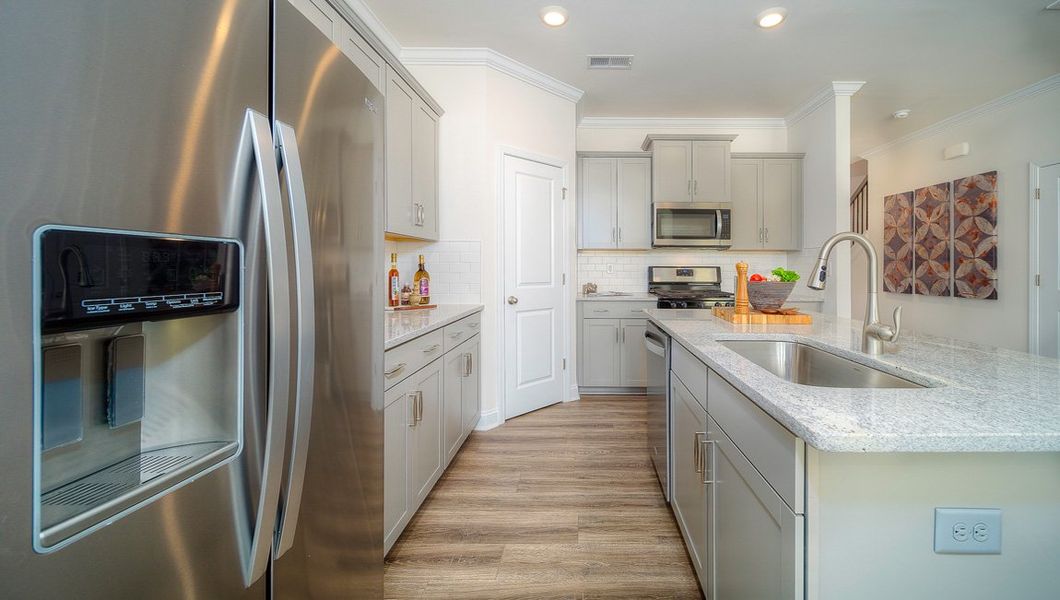 Furnished interior view inside a new home in Townes at Tap Root Farms, Fletcher (Image 11). Furnished interior view inside a new home in Townes at Tap Root Farms, Fletcher (Image 11).