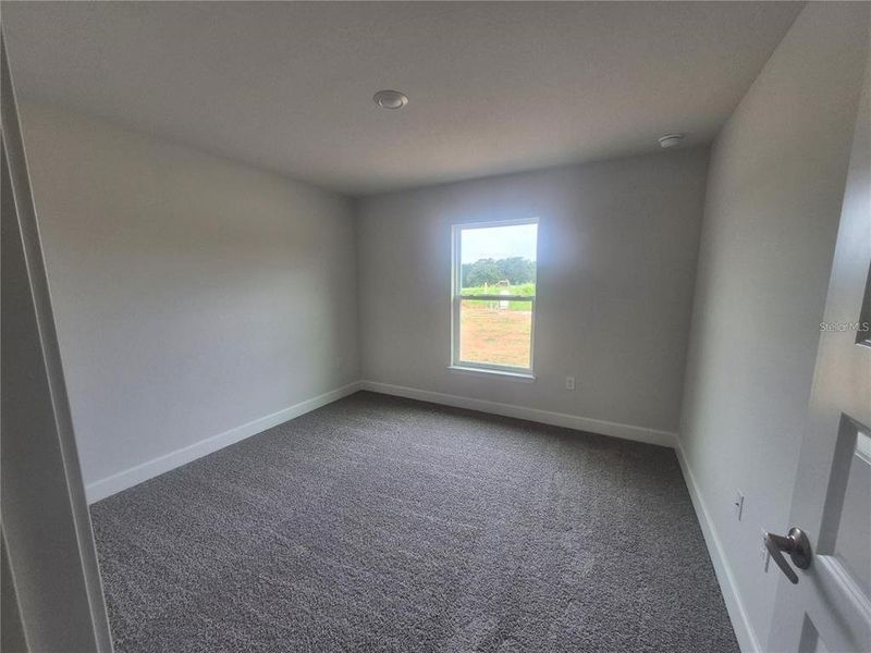Spacious, unfurnished interior of a new home in Hill Country Estates, Dade City (Image 12).