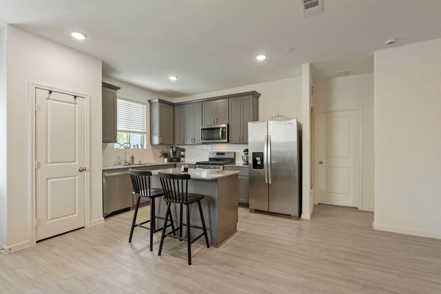 Furnished interior view inside a new home in Myrtle Gardens, Magnolia (Image 25). Furnished interior view inside a new home in Myrtle Gardens, Magnolia (Image 25).