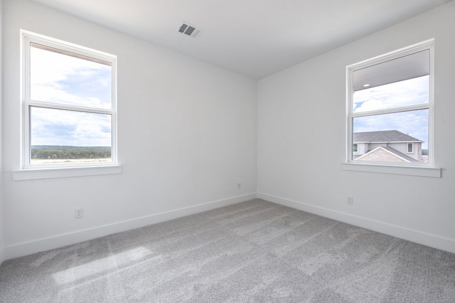 Spacious, unfurnished interior of a new home in Sage Collection – Freedom at Anthem, Kyle (Image 12).