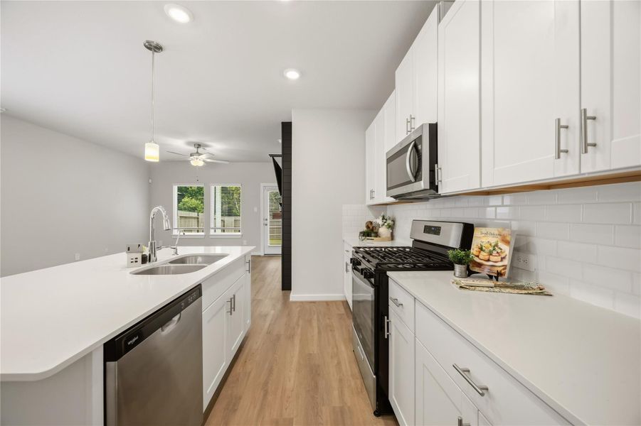 Large open kitchen with lots of counter space. Large open kitchen with lots of counter space.