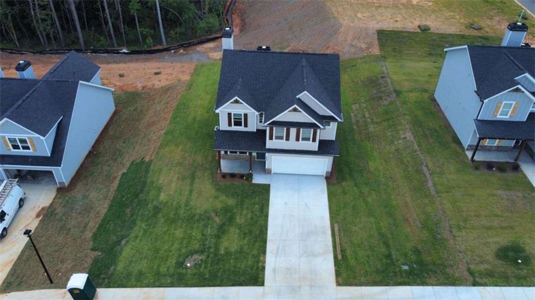 Front exterior of a new home in , Lula, GA, highlighting curb appeal (Image 18). Front exterior of a new home in , Lula, GA, highlighting curb appeal (Image 18).