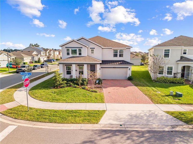 Front exterior of a new home in , St. Cloud, FL, highlighting curb appeal (Image 25).