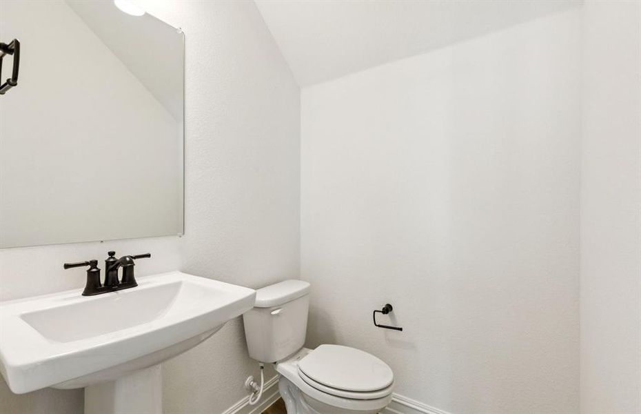 Half bathroom on first level Half bathroom on first level