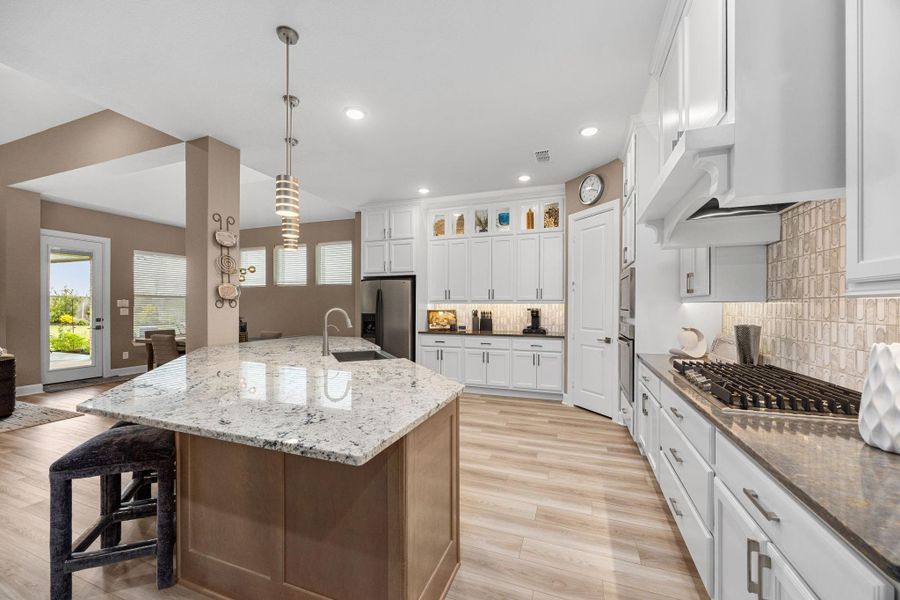 Level 6 granite countertops showcase this magnificent, Chefs kitchen.