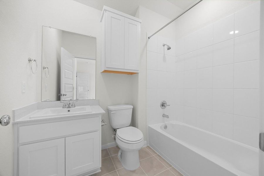 Bathroom in the Magnolia home plan by Trophy Signature Homes – REPRESENTATIVE PHOTO