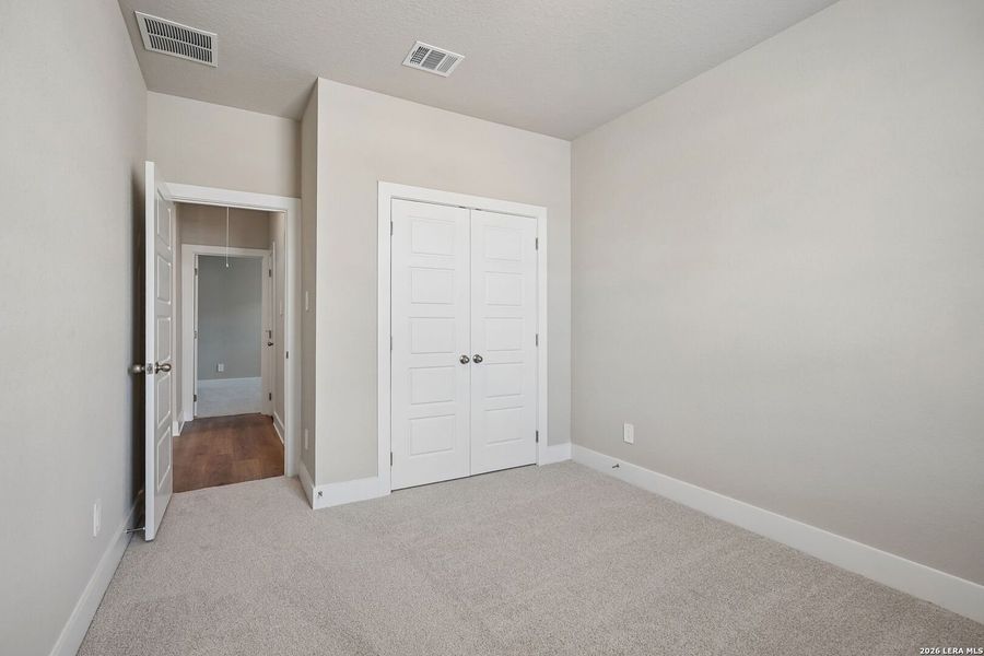 Spacious, unfurnished interior of a new home in Legendary Trails - Premier Series, Cibolo (Image 34). Spacious, unfurnished interior of a new home in Legendary Trails - Premier Series, Cibolo (Image 34).