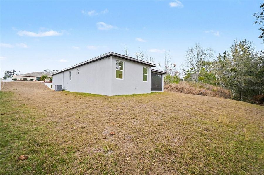 Exterior details and patio area of a home in , Spring Hill (Image 4).