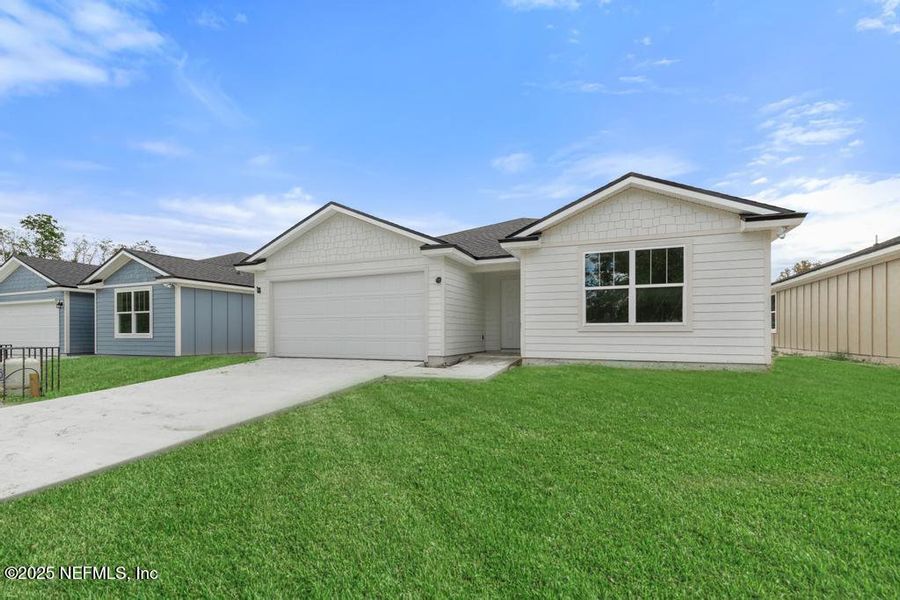 Front exterior of a new home in , Jacksonville, FL, highlighting curb appeal (Image 21). Front exterior of a new home in , Jacksonville, FL, highlighting curb appeal (Image 21).