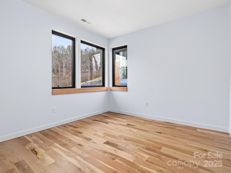 Spacious, unfurnished interior of a new home in , Asheville (Image 25).