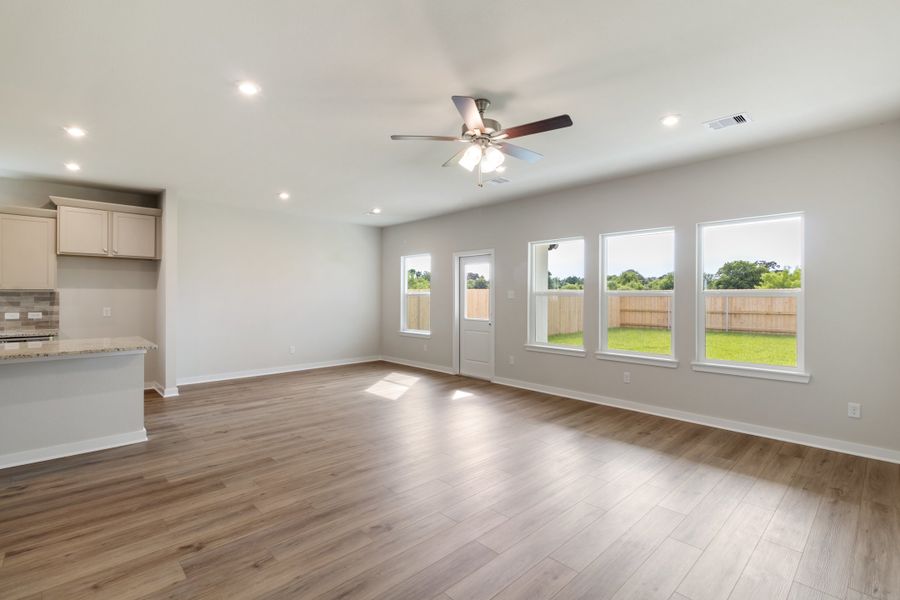 Representative unfurnished interior of a home built from the Guadalupe by Omega Builders in Hillside Village, Temple (Image 5).