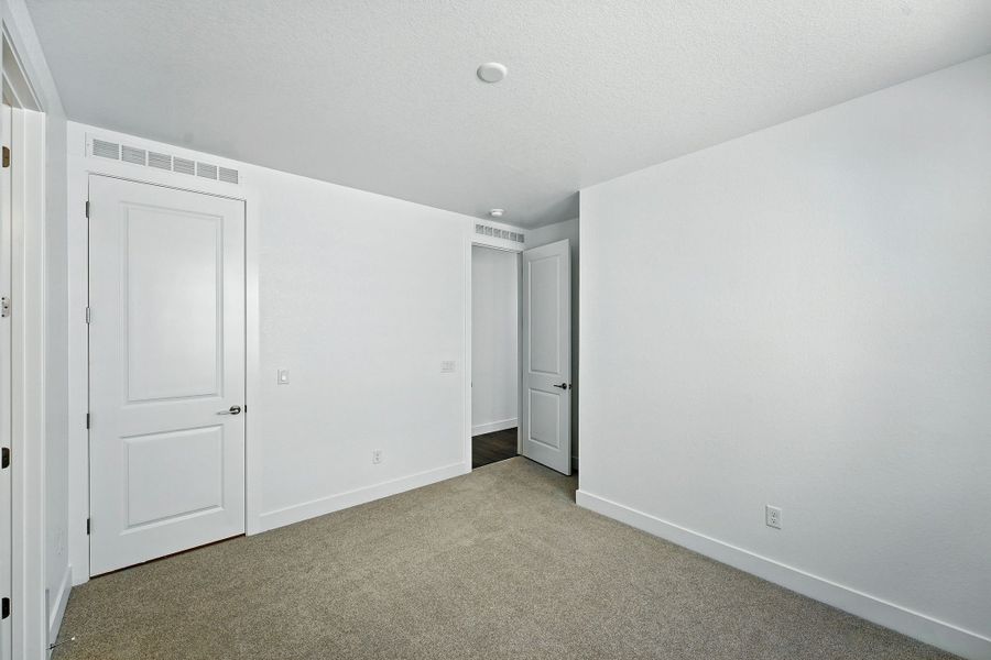 Spacious, unfurnished interior of a new home in Macanta, Castle Rock (Image 22).