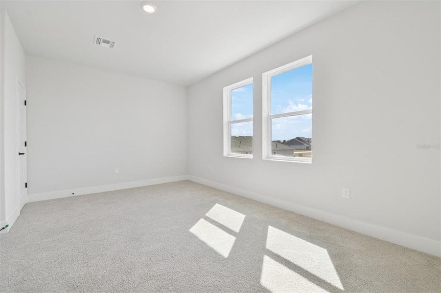 Spacious, unfurnished interior of a new home in Waterset Tradition Series, Apollo Beach (Image 29).