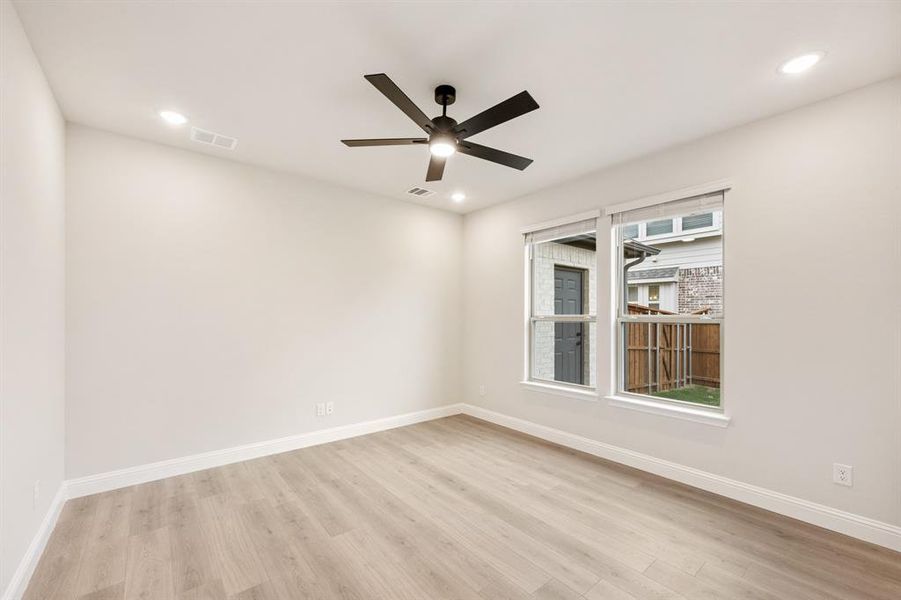 Spacious, unfurnished interior of a new home in Villages of Hurricane Creek, Anna (Image 34).