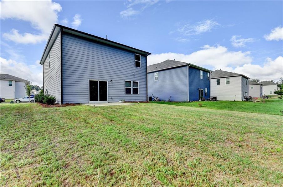 Front exterior of a new home in , Braselton, GA, highlighting curb appeal (Image 28).