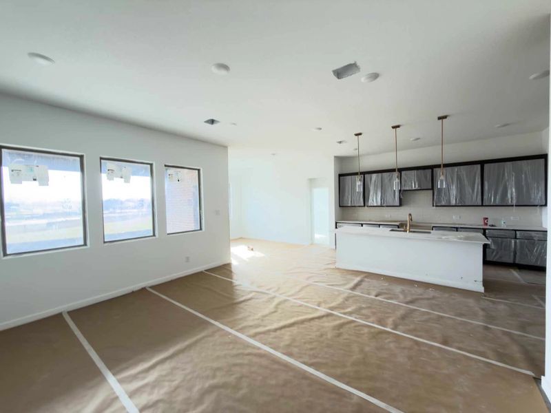 Open Kitchen-Living-Dining Room Construction Progress featuring the Oxford Collection