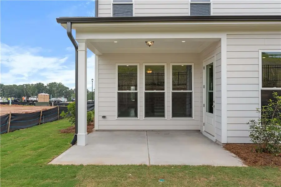 Exterior details and patio area of a home in Palisades Single Family, Cumming (Image 2). Exterior details and patio area of a home in Palisades Single Family, Cumming (Image 2).