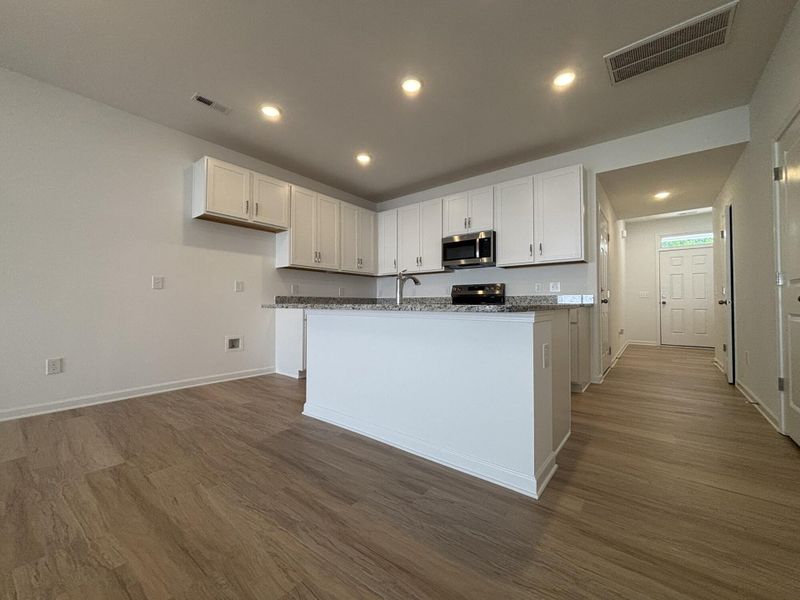 Furnished interior view inside a new home in CraigStone, Woodruff (Image 4).