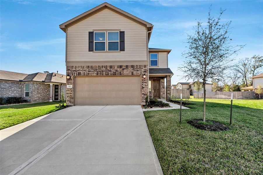 A beautiful two story home with two car garage