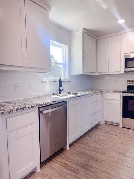 Furnished interior view inside a new home in , Springtown (Image 3). Furnished interior view inside a new home in , Springtown (Image 3).