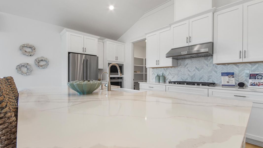 Representative furnished interior of a home built from the Jubilee by D.R. Horton in Breakfast Point East Phase II, Panama City Beach (Image 12).