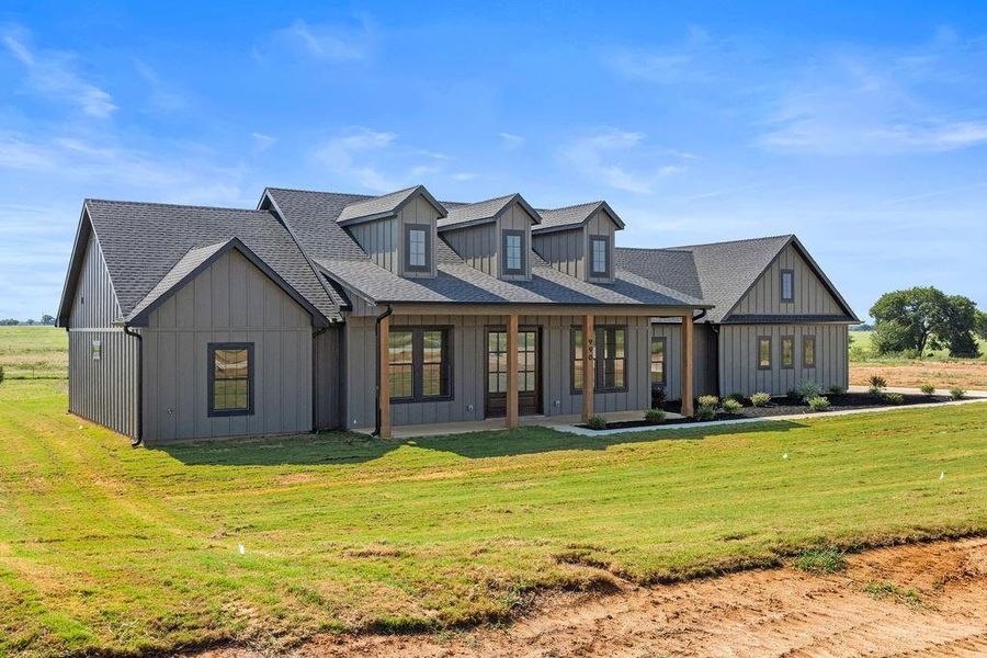 Front exterior of a new home in , Whitesboro, TX, highlighting curb appeal (Image 1). Front exterior of a new home in , Whitesboro, TX, highlighting curb appeal (Image 1).