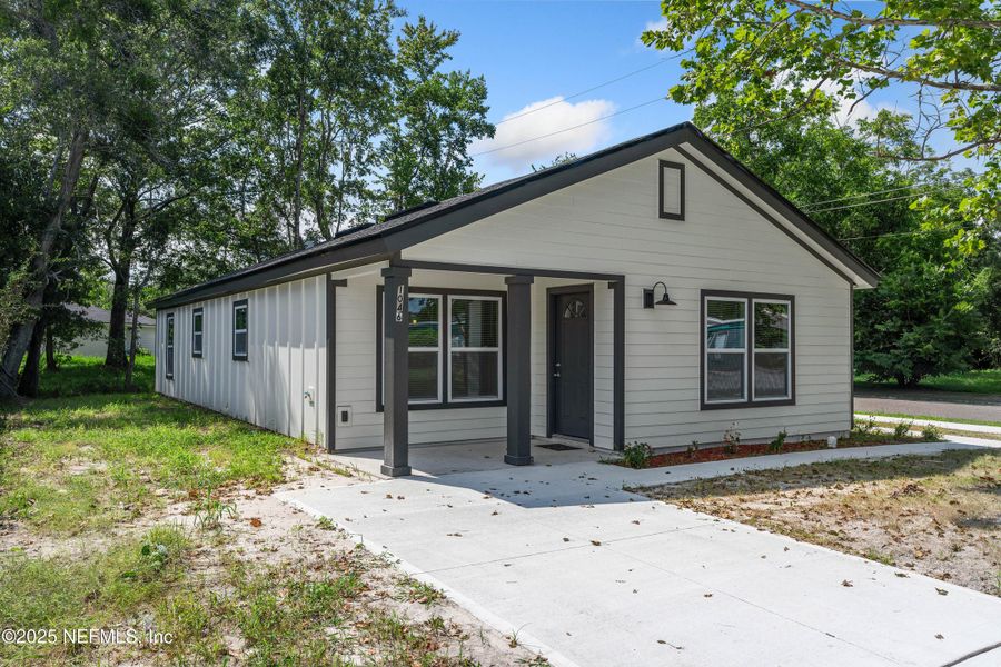 Front exterior of a new home in , Jacksonville, FL, highlighting curb appeal (Image 21). Front exterior of a new home in , Jacksonville, FL, highlighting curb appeal (Image 21).
